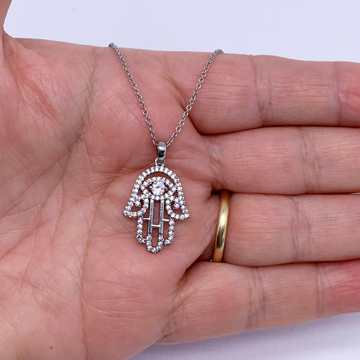 silver swarovski crystal hamsa pendant necklace frenelle jewellery