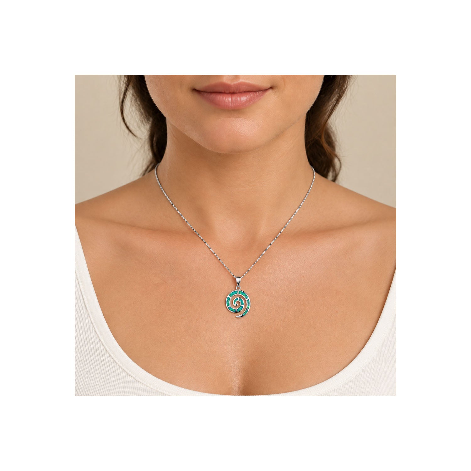 silver koru NZ necklace with opal frenelle jewellery