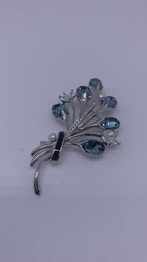 video of blue flower spray brooch