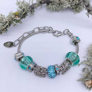 silver charm bracelet green beads crystals nz