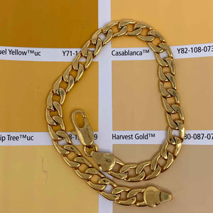 gold curb link chain bracelet