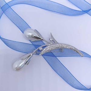 white pearl silver brooch blue ribbon