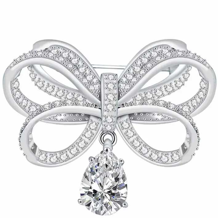 silver bow brooch crystal