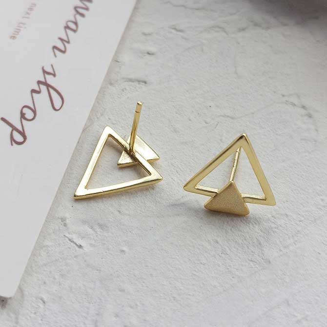 gold modern stud earrings geometric