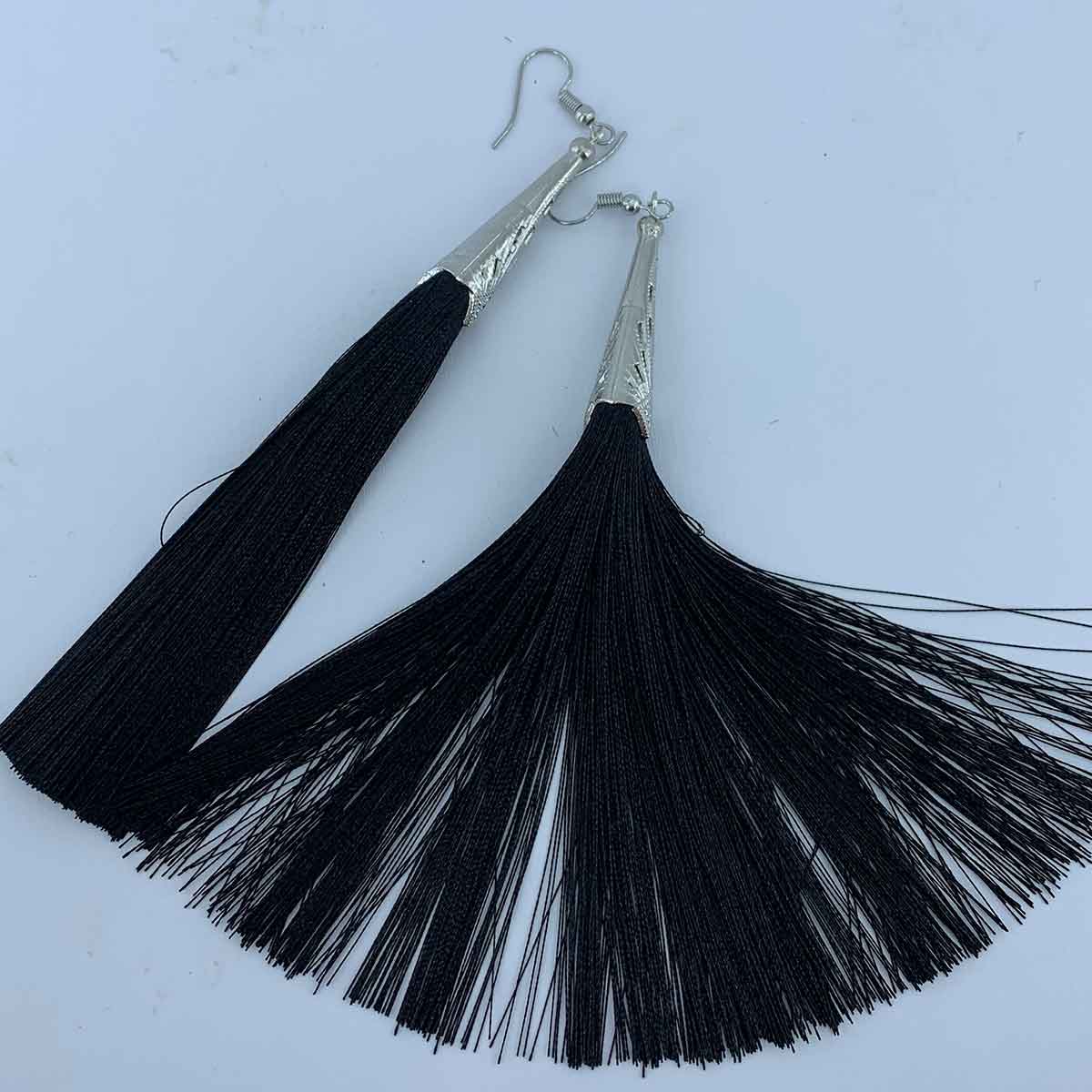 Long black deals tassel earrings