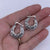 silver koru hoop earrings