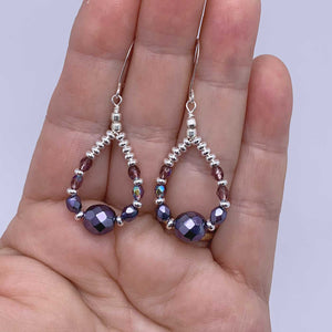 amethyst silver drop earrings hand