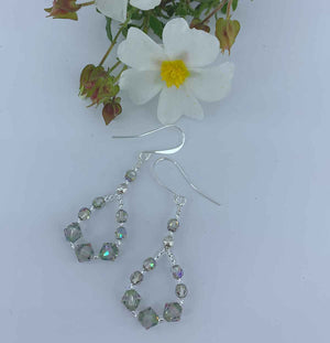 green crystal silver drop earrings