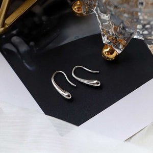 gold teardrop earrings with silver