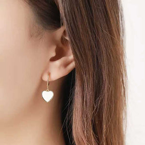 white gold dangle heart earrings