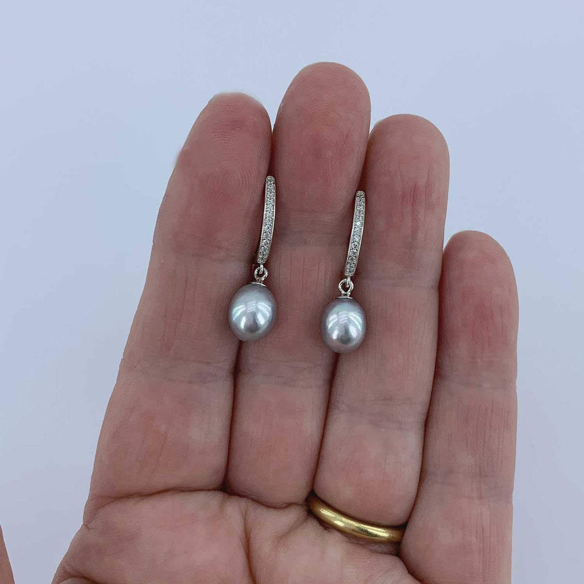 grey pearls silver huggie earrings