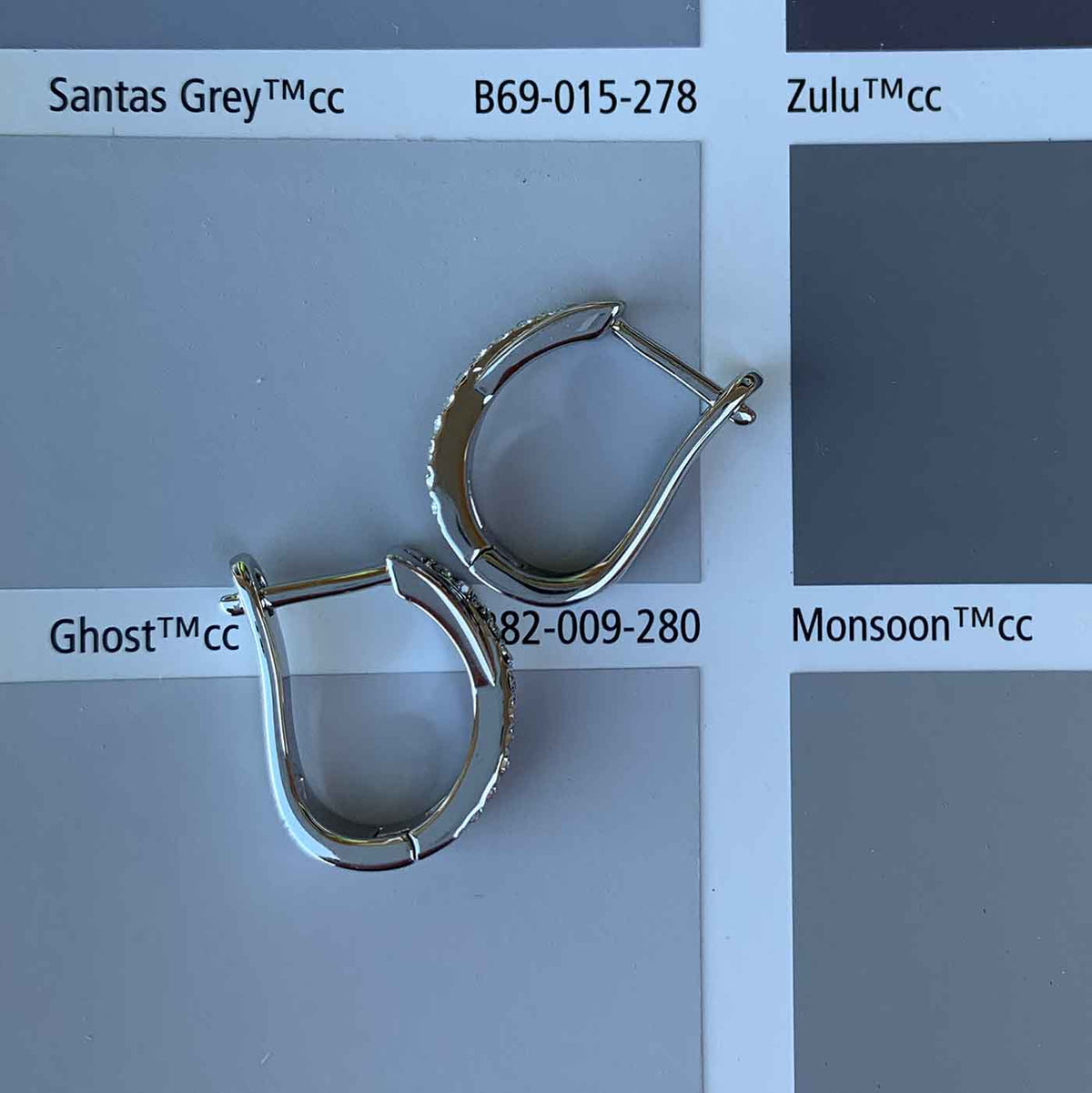 silver huggie premium crystal earrings