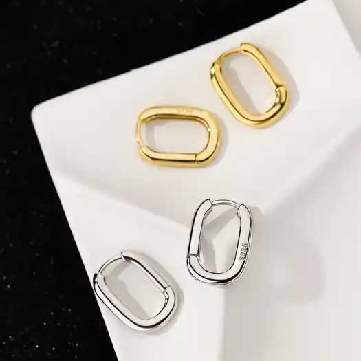 gold huggie earrings silver