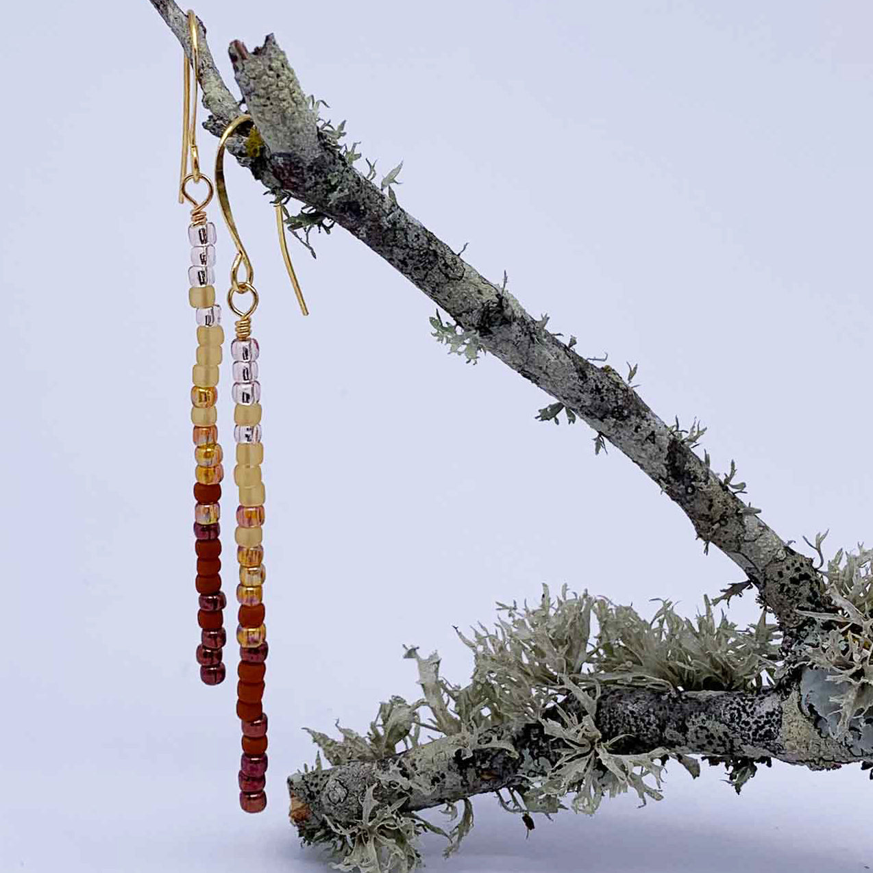 red bead tassel earrings