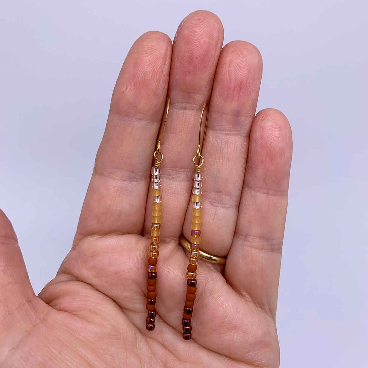 red bead tassel earrings