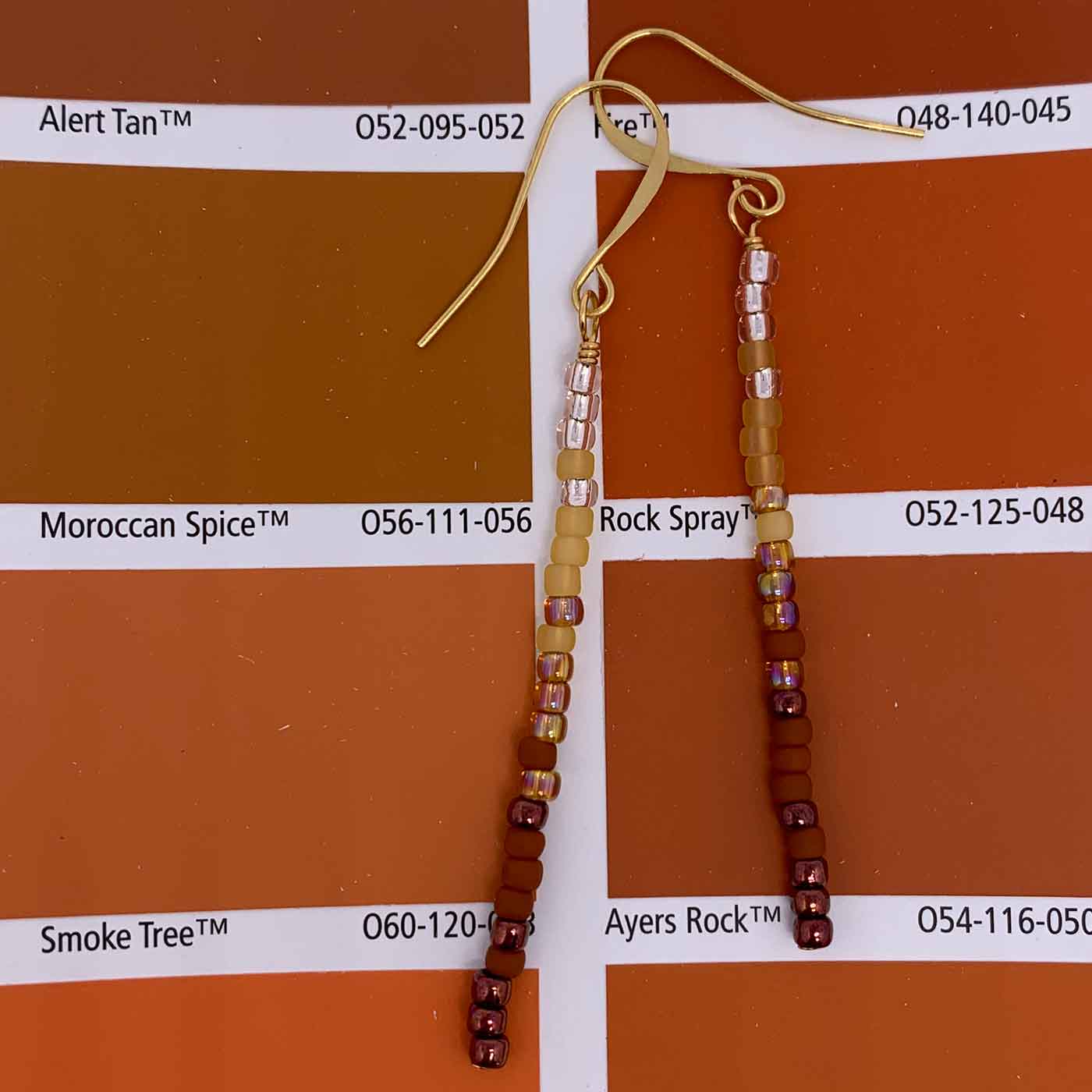 red bead tassel earrings