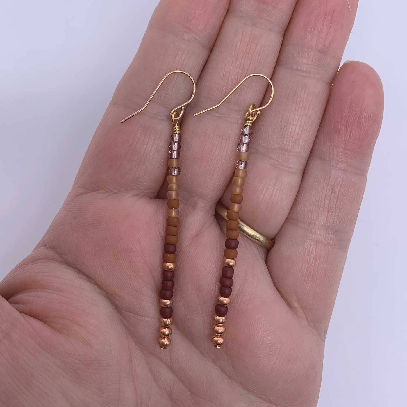 rose gold bead tassel earrings