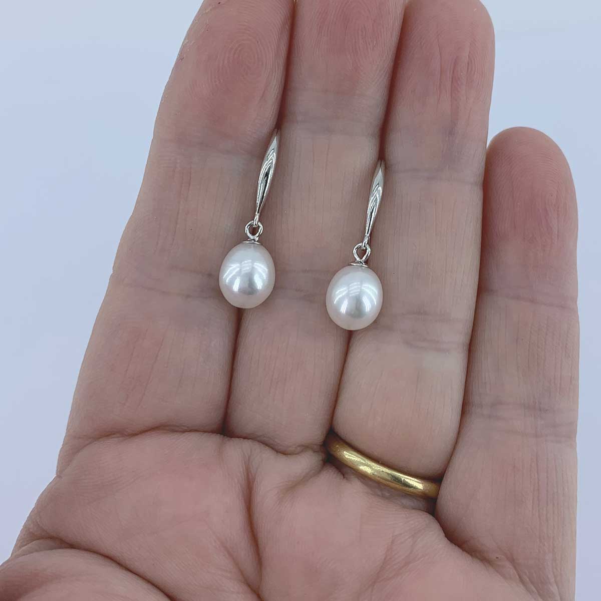 white pearl silver earring