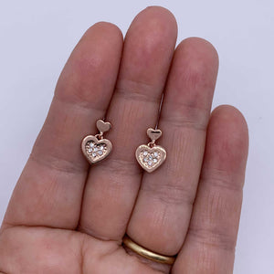 rose gold heart crystal dangle earrings hand