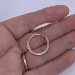 rose gold opal hoop earrings hand