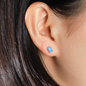 blue opal silver stud earrings ear