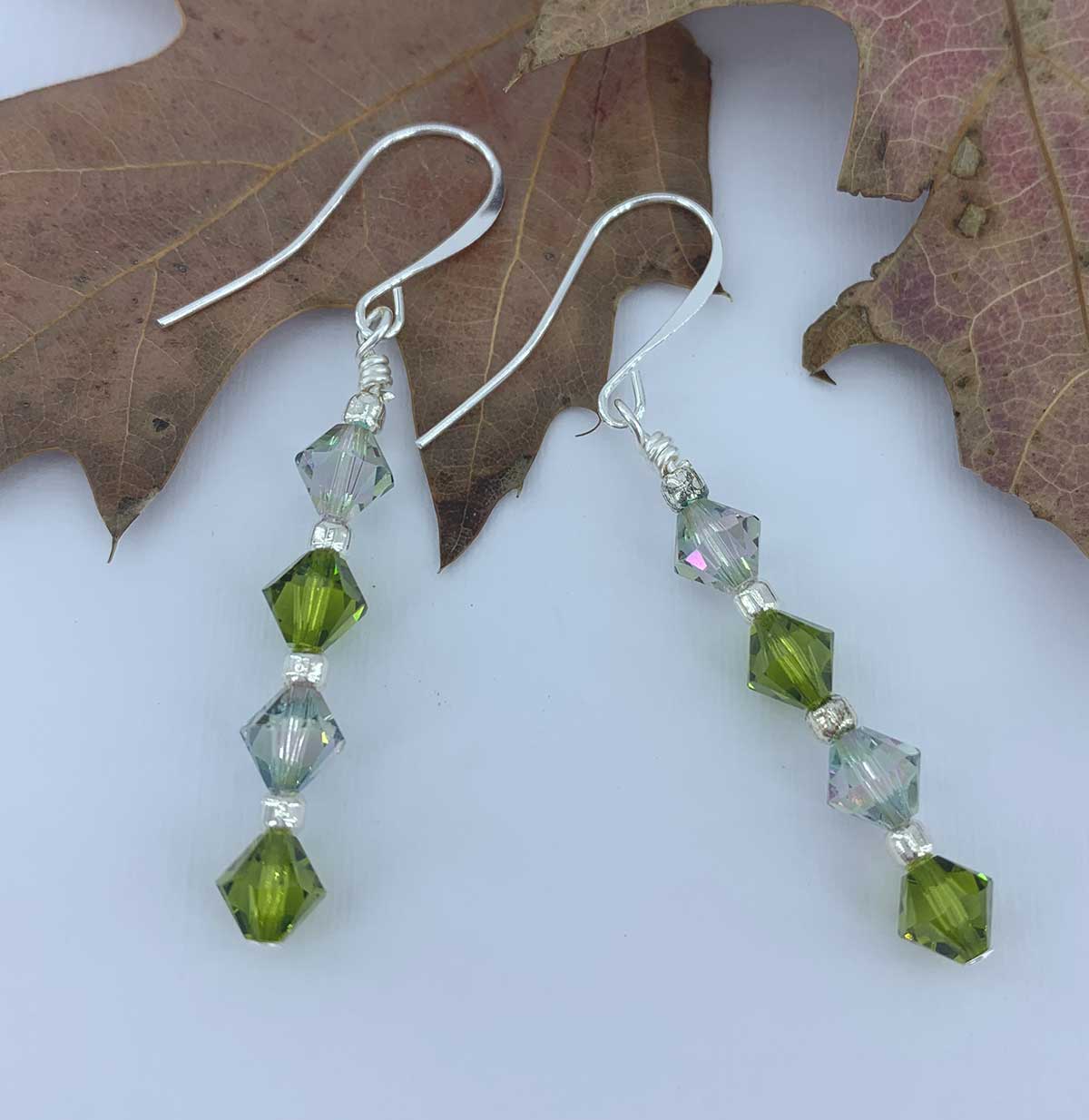 green crystal drop silver earrings