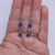 gold drop earrings with blue crystals