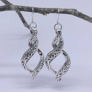 silver koru earrings jewellery
