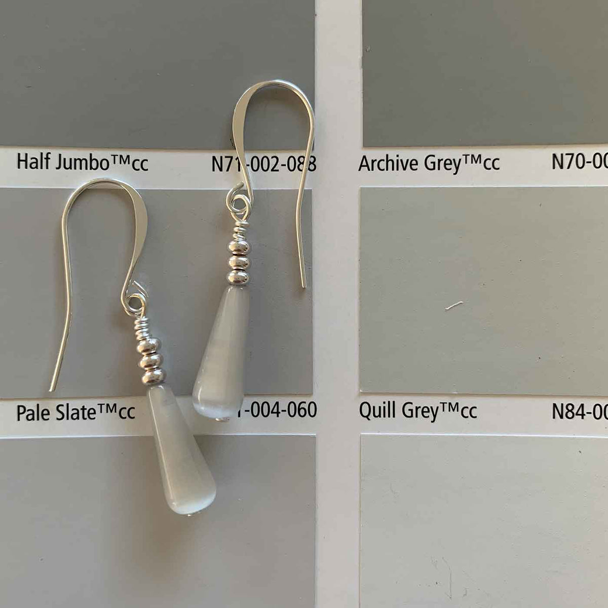 grey drop silver earrings resene