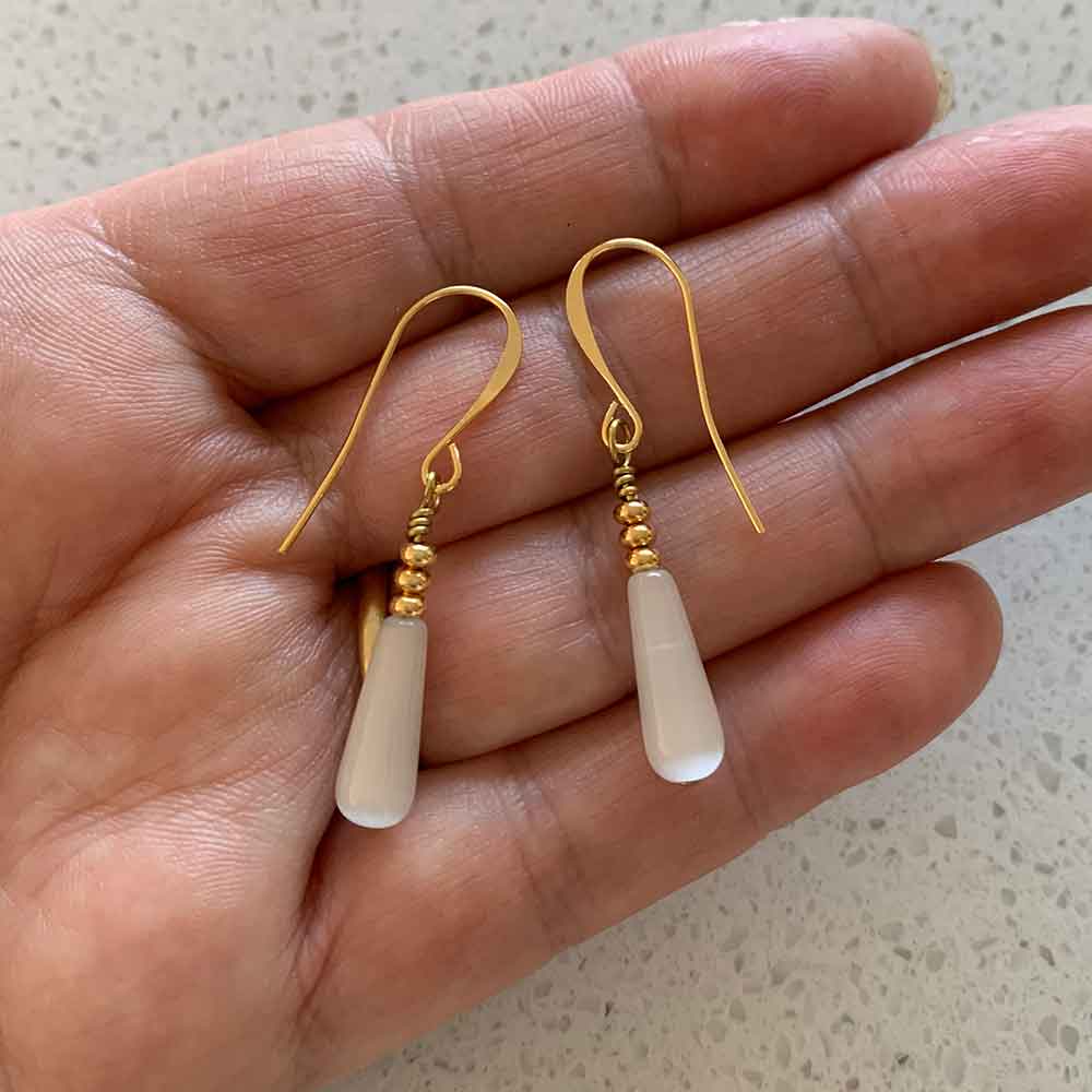 gold drop earrings white jewellery