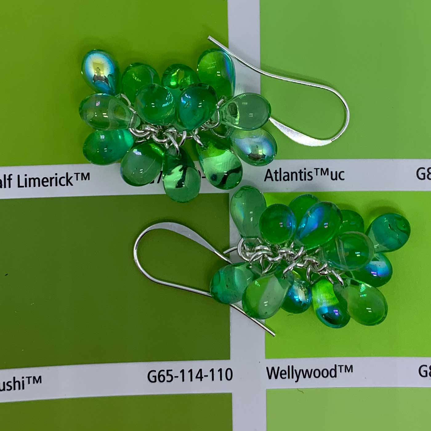 green crystal drop silver earrings