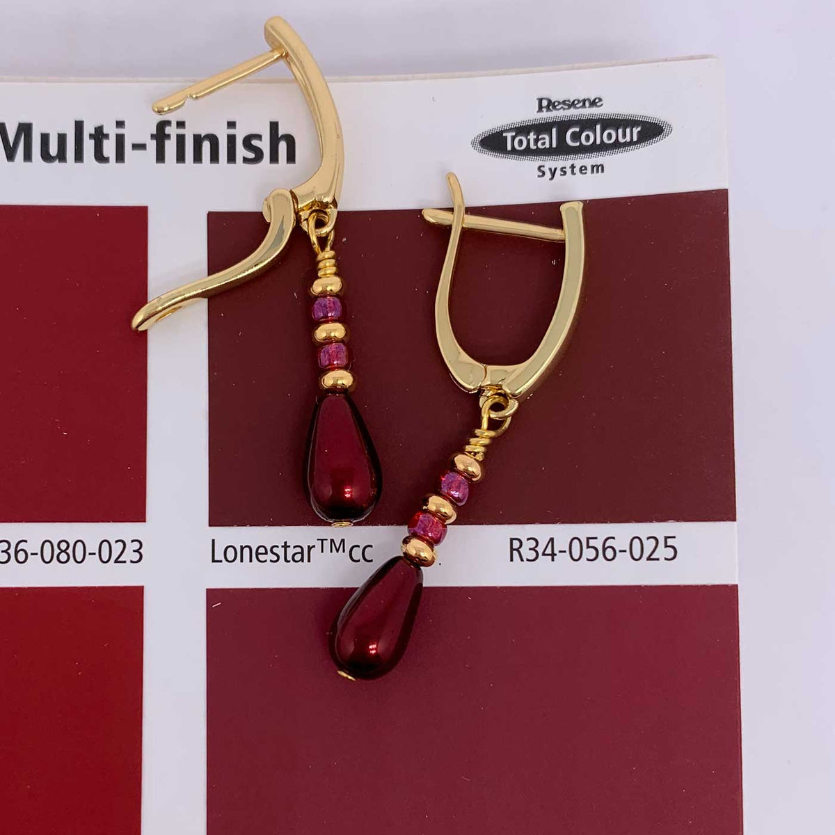 gold huggie red drop earring nz