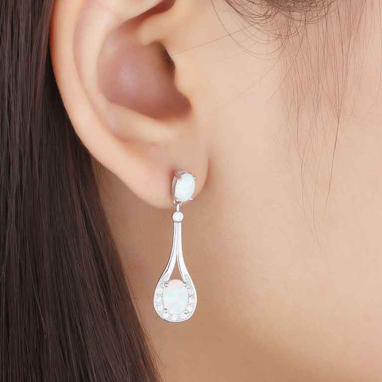 white opal silver drop earrings
