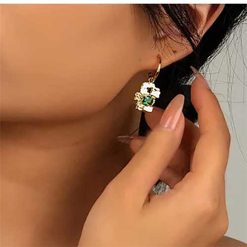 gold dangle earring green cz diamond