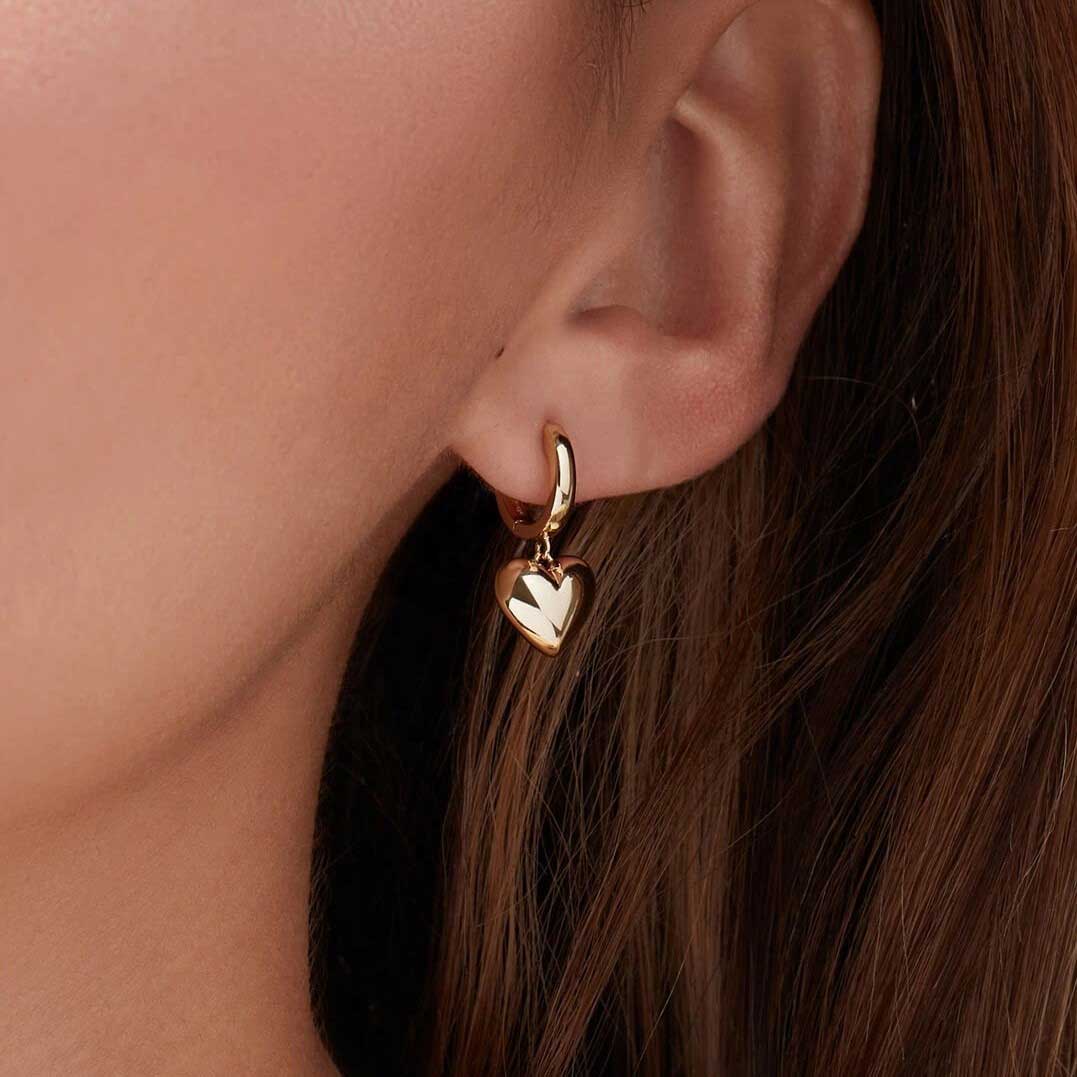 gold huggie heart earrings