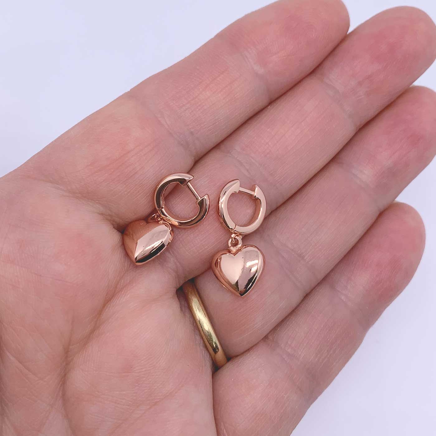 rose gold huggie heart earrings