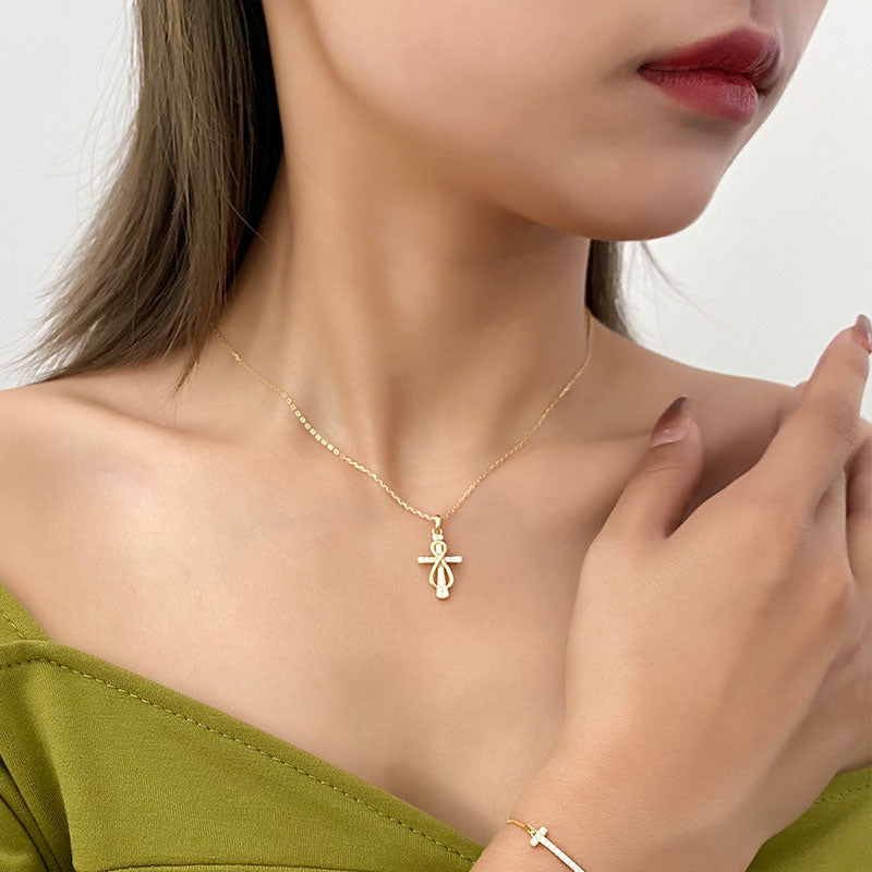 .50 ct. t.w. Diamond Infinity Cross Pendant Necklace in Sterling Silver and  14kt Yellow Gold | Ross-Simons