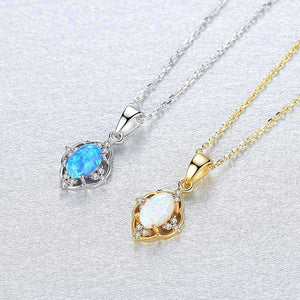 gold necklace opal pendant and blue