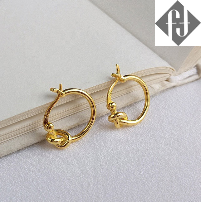 gold knotted earrings huggie