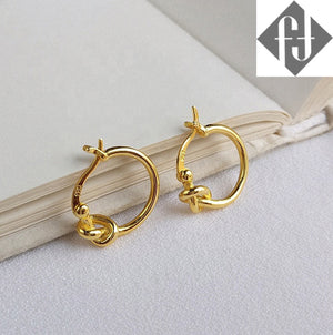 gold knotted earrings huggie