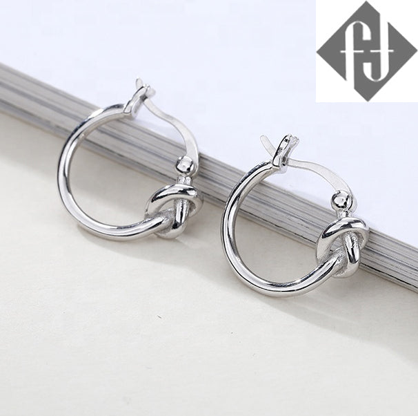 silver knotted huggie earring