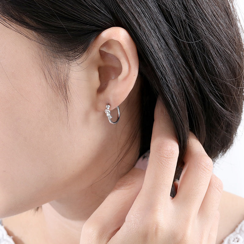 silver knotted huggie earring