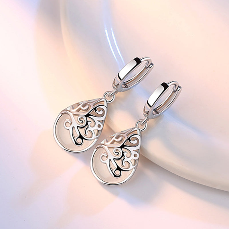 huggie silver pear drop earring for women