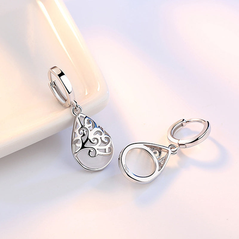 huggie silver pear drop earring for women
