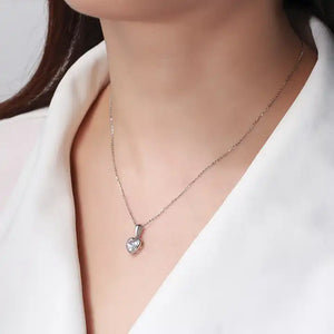 silver heart necklace neck